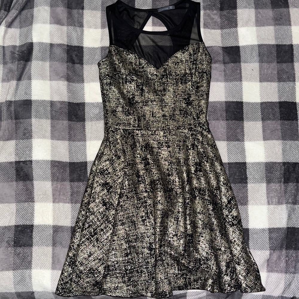 Gold and black dress with sheer neck line